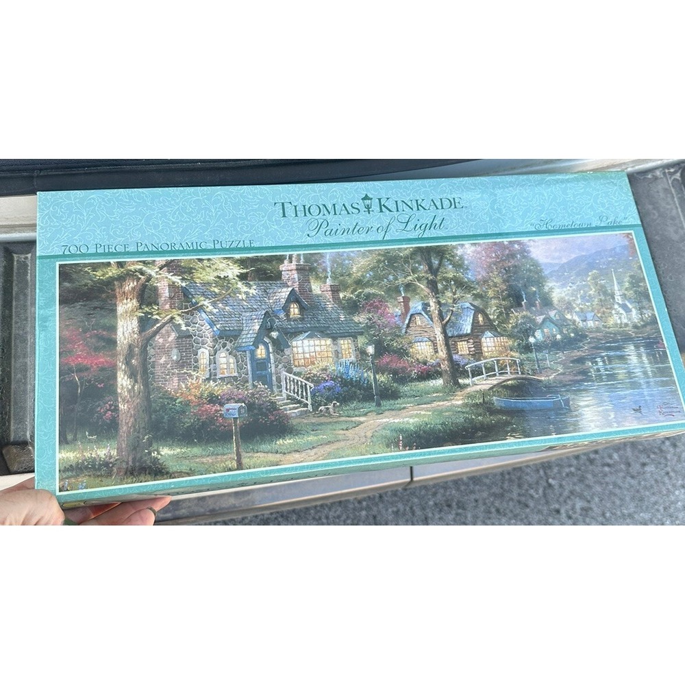 Thomas Kinkade Painter of Light 700 Piece Puzzle Hometown Lake 34"x12" SEALED - Picture 1 of 7